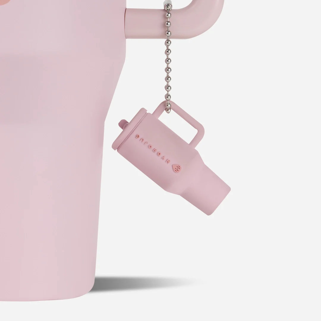 traveler-keychain-l5 Web-TravelerKeychainPhotos-PinkSand2.webp